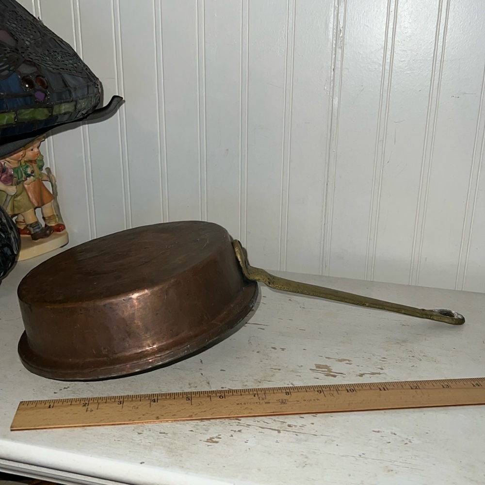 Antique farmhouse hand hammered copper pan with brass handle